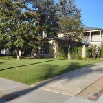 As you drive up the 100' driveway you see the house with the courtyard and balcony.