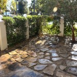 Walking through the gate you see the flagstone covered courtyard ...