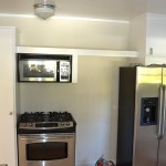 The small galley kitchen is going to present some design challenges.