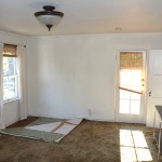 The master bedroom has the door leading out to the balcony.