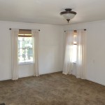 takes you to the master bedroom on the right, a bathroom straight ahead and the guest bedroom to the left.